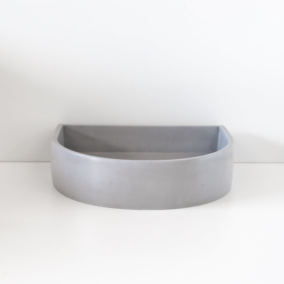 Sticks & Stone Concrete Polished Half Moon Basin