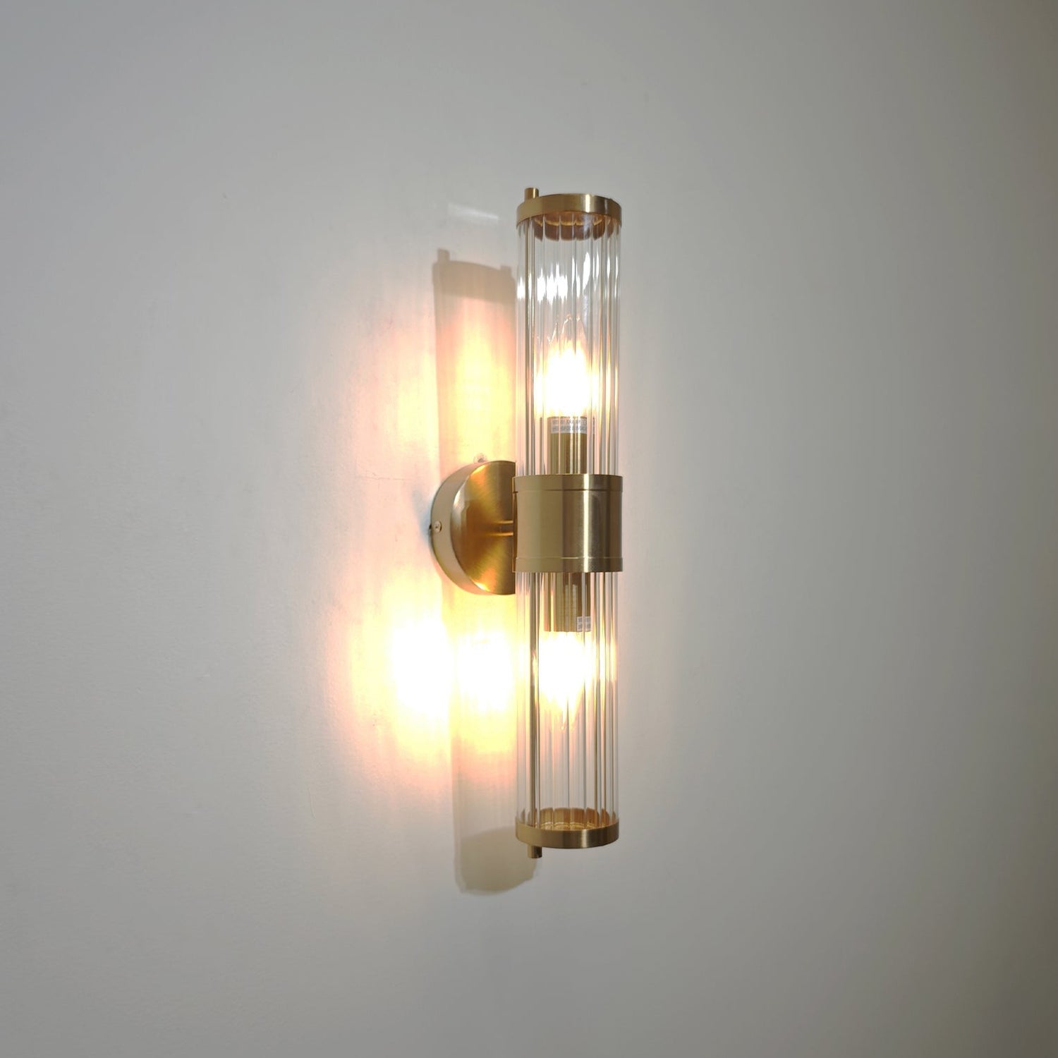 TIEMPO: Interior Up/Down Tubular Clear Glass Wall Lights