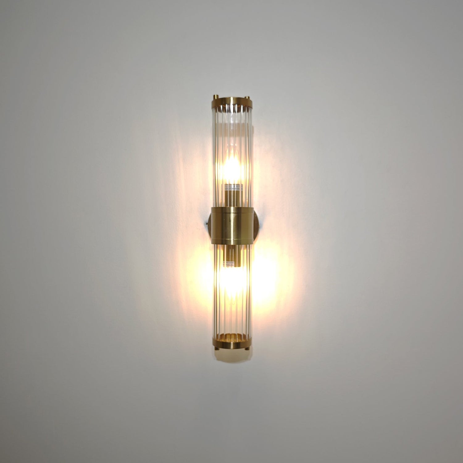 TIEMPO: Interior Up/Down Tubular Clear Glass Wall Lights