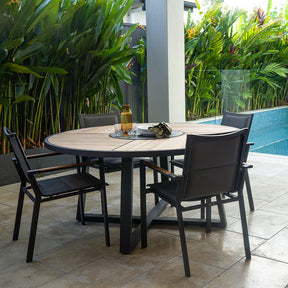 Weston Outpost Round Teak Dining Table – 1.6m – Asteroid Black (Charcoal) Powder Coated Legs