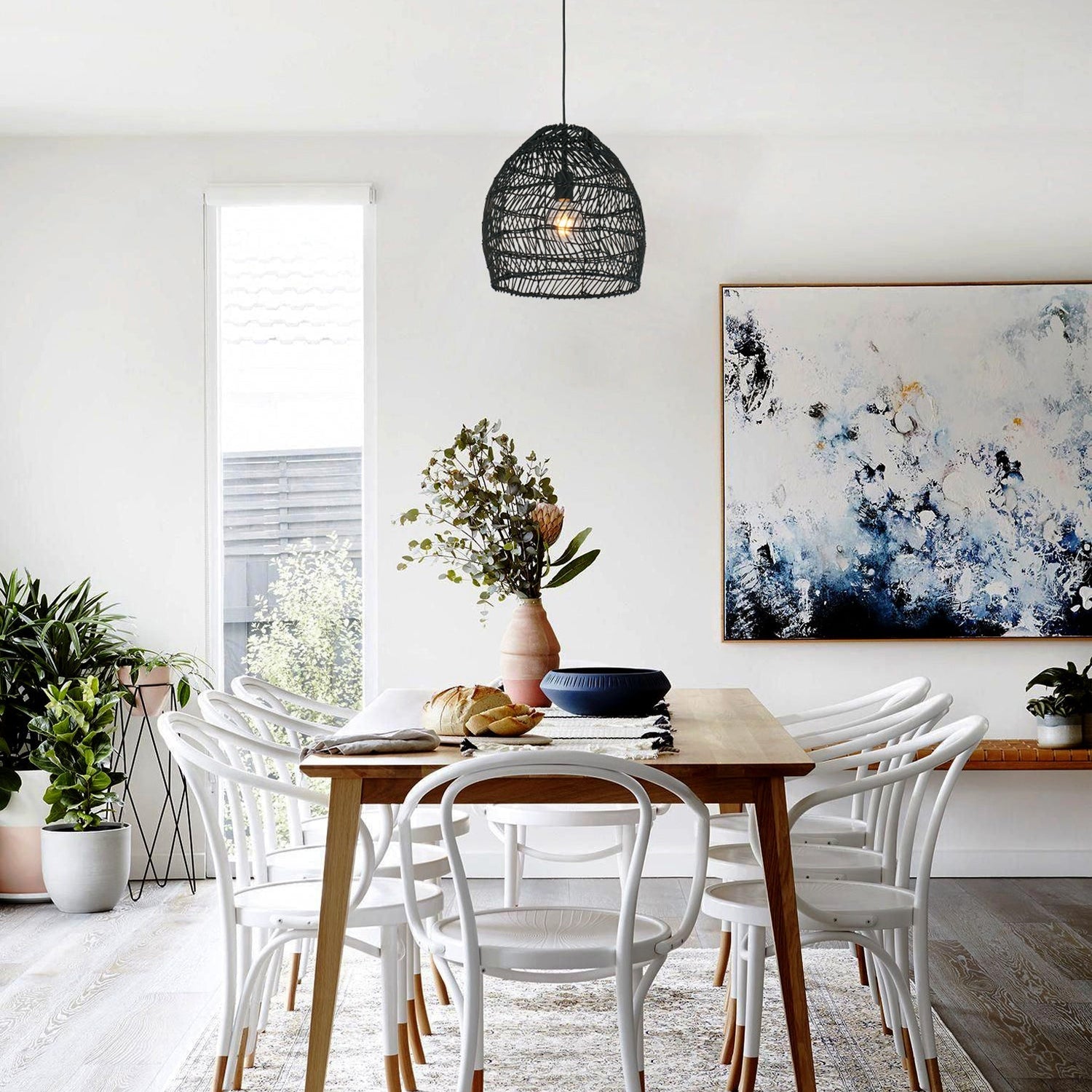 COUP: Bohemian Interior Rattan Matte Black Ellipse Pendant Light