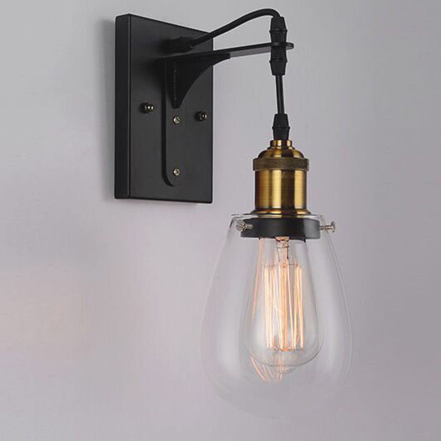 STRUNG: Interior Decorative Black / Antique Brass and Clear Pear Shape Glass Wall Light